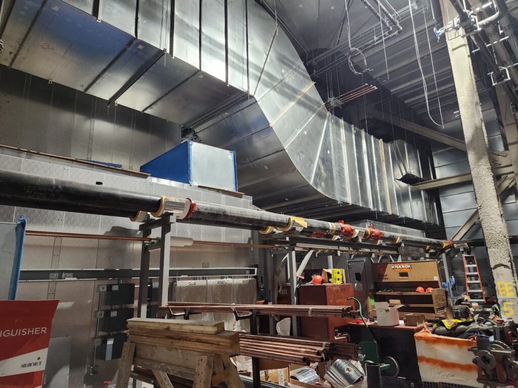 12 Feet Ductwork In Place. Piping Installation In Progress