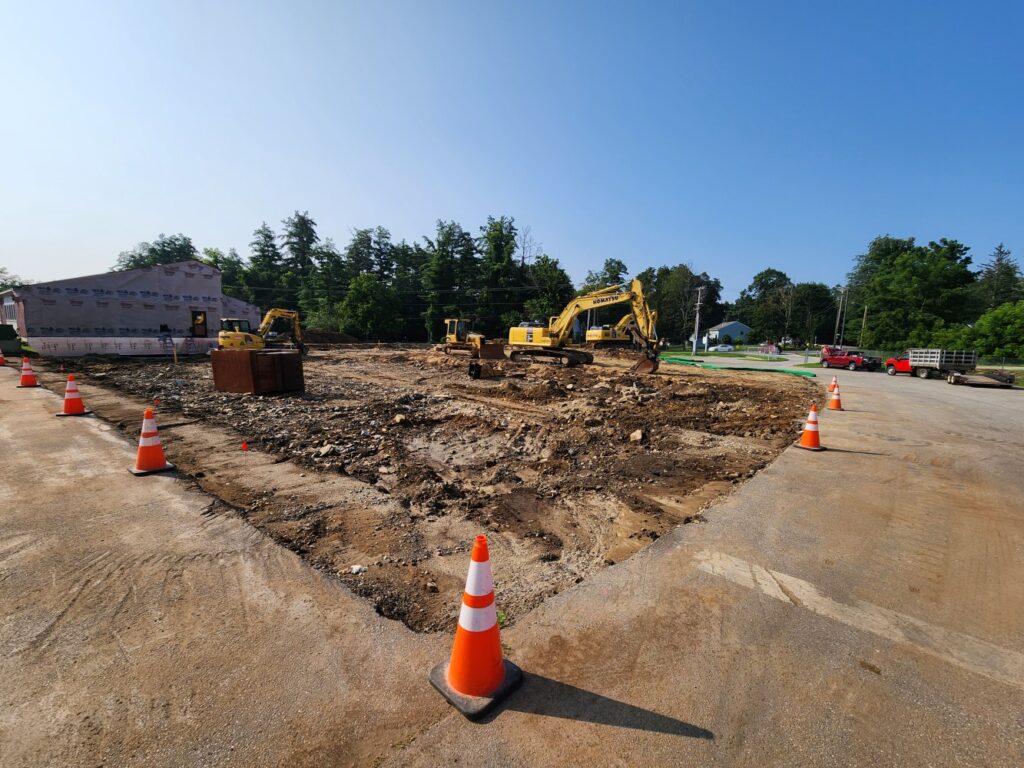 Phase I - Demolition of One-Half of Old Structure and Excavation Commences
